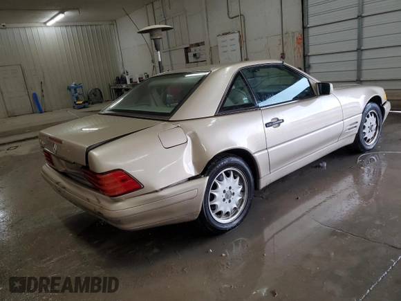 1997 Mercedes-Benz SL 500 with VIN WDBFA67F5VF147986, listed as a Copart auction lot 84255574 with 158,607 mi miles and Salvage title. Bid and sale history available at DreamBid. Image 3.