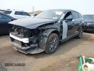 2023 Mazda CX-9 Touring with VIN JM3TCBCY6P0642838, listed as a IAAI auction lot 42407123 with 15,181 mi miles and . Bid and sale history available at DreamBid. Image 18.