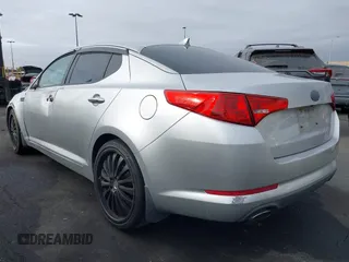 2013 Kia Optima LX with VIN KNAGM4A75D5430974, listed as a IAAI auction lot 41209055 with 197,871 mi miles. Bid and sale history available at carsss.com. Image 3.