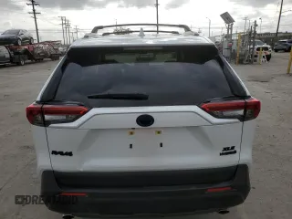 2024 Toyota RAV4 Hybrid XLE Premium with VIN JTMB6RFV3RJ059534, listed as a Copart auction lot 54611825 with 6,319 mi miles and Salvage Title. Bid and sale history available at carsss.com. Image 6.