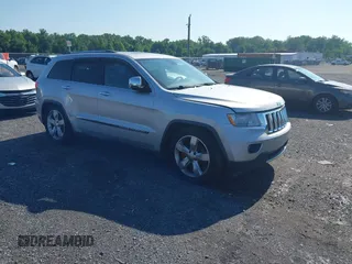 2011 Jeep Grand Cherokee Overland Summit with VIN 1J4RR6GT9BC535985, listed as a IAAI auction lot 42556913 with 108,845 mi miles and . Bid and sale history available at DreamBid. Image 1.