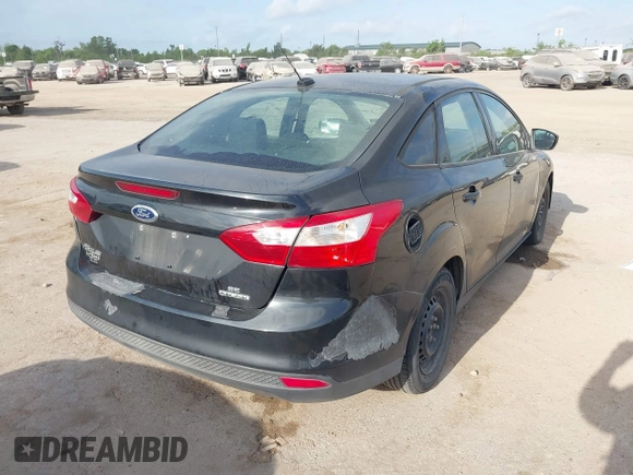 2012 Ford Focus SE with VIN 1FAHP3F24CL381806, listed as a IAAI auction lot 42058773 with Not Provided miles and . Bid and sale history available at DreamBid. Image 4.