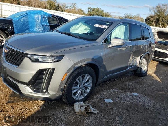 2023 Cadillac XT6 FWD Luxury z VIN 1GYKPAR48PZ115719, wystawiony jako Copart lot #87848435 z przebiegiem 17 597 mil mil oraz Szkoda całkowita • Salvage title. Historia ofert i sprzedaży dostępna na DreamBid. Obrazek 1.