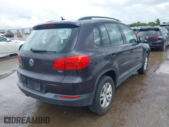 2016 Volkswagen Tiguan SE with VIN WVGAV7AX4GW580074, listed as a IAAI auction lot 42478199 with 114,357 mi miles and . Bid and sale history available at DreamBid. Image 4.