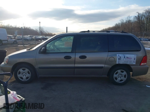 2005 Ford Freestar SE z VIN 2FMZA51645BA05742, wystawiony jako IAAI lot #41429194 z przebiegiem 145 415 mil mil oraz . Historia ofert i sprzedaży dostępna na DreamBid. Obrazek 14.