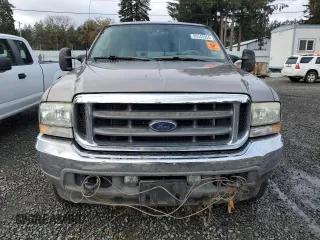 2003 Ford F-350 XL with VIN 1FTSW31F13EA13259, listed as a Copart auction lot 80345954 with 209,898 mi miles and Salvage title. Bid and sale history available at DreamBid. Image 5.