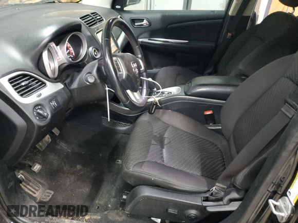 2013 Dodge Journey Crew with VIN 3C4PDCCG4DT693869, listed as a Copart auction lot 63666684 with 134,424 mi miles and Salvage title. Bid and sale history available at DreamBid. Image 7.