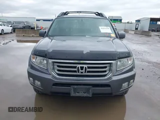 2014 Honda Ridgeline RTL with VIN 5FPYK1F50EB002577, listed as a IAAI auction lot 41931258 with 147,665 mi miles. Bid and sale history available at carsss.com. Image 12.