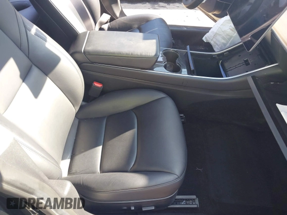 2020 Tesla Model 3 Standard Range Plus with VIN 5YJ3E1EA0LF660759, listed as a IAAI auction lot 41505250 with 63,322 mi miles and . Bid and sale history available at DreamBid. Image 5.