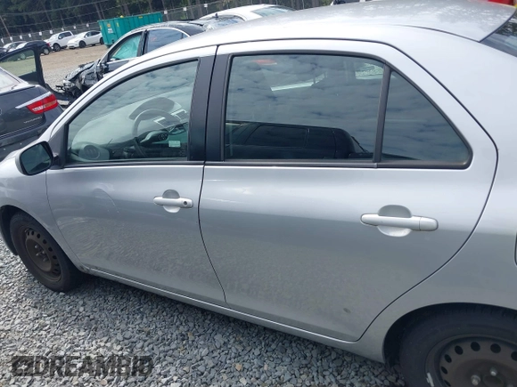 2009 Toyota Yaris with VIN JTDBT903391322248, listed as a IAAI auction lot 40112165 with 193,625 mi miles. Bid and sale history available at carsss.com. Image 14.