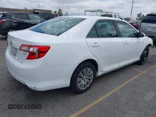 2014 Toyota Camry L with VIN 4T1BF1FK4EU403013, listed as a IAAI auction lot 42115089 with 221,686 mi miles and . Bid and sale history available at DreamBid. Image 4.