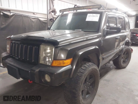 2006 Jeep Commander with VIN 1J8HG48KX6C263348, listed as a IAAI auction lot 42128039 with 208,605 mi miles and . Bid and sale history available at DreamBid. Image 18.