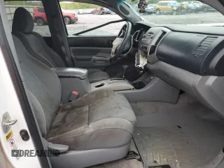 2011 Toyota Tacoma PreRunner with VIN 3TMJU4GN5BM113539, listed as a Copart auction lot 52208635 with 304,559 mi miles and Salvage Title. Bid and sale history available at DreamBid. Image 7.