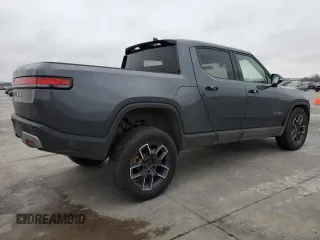 2022 Rivian R1T Launch Edition with VIN 7FCTGAAL7NN002288, listed as a Copart auction lot 43393815 with 46,927 mi miles and Salvage Title. Bid and sale history available at carsss.com. Image 3.