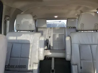 2013 Lincoln Navigator z VIN 5LMJJ3J50DEL03522, wystawiony jako Copart lot #54768335 z przebiegiem 137 326 mil mil oraz Czysty tytuł • Clean title. Historia ofert i sprzedaży dostępna na DreamBid. Obrazek 10.