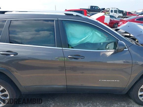 2019 Jeep Cherokee Latitude Plus with VIN 1C4PJLLB3KD143546, listed as a IAAI auction lot 42160353 with 69,296 mi miles and . Bid and sale history available at DreamBid. Image 14.