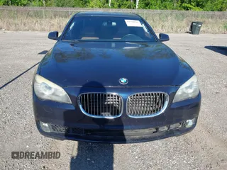 2011 BMW 7 Series 740i with VIN WBAKA4C52BC392112, listed as a IAAI auction lot 41736939 with 125,953 mi miles and . Bid and sale history available at carsss.com. Image 6.