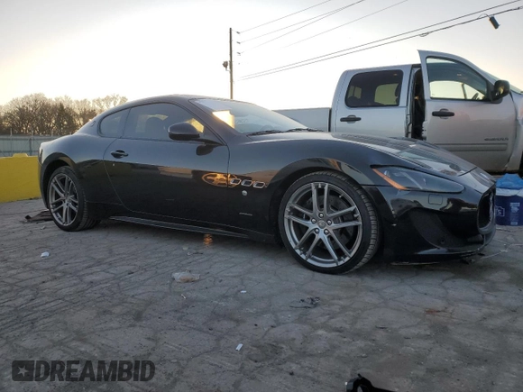 2013 Maserati GranTurismo Sport with VIN ZAM45VLA7D0073260, listed as a Copart auction lot 85929914 with 74,045 mi miles and Salvage title. Bid and sale history available at DreamBid. Image 4.