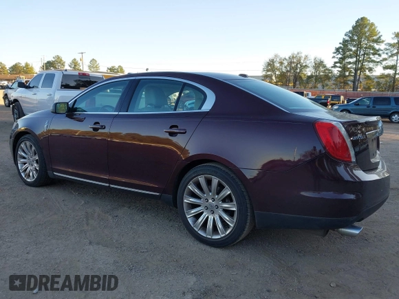 2011 Lincoln MKS z VIN 1LNHL9DRXBG606788, wystawiony jako IAAI lot #40963426 z przebiegiem 127 108 mil mil oraz . Historia ofert i sprzedaży dostępna na DreamBid. Obrazek 3.