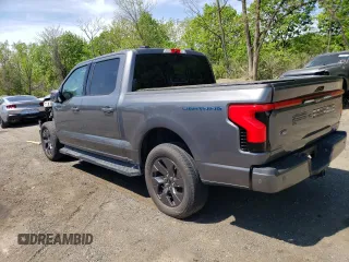 2022 Ford F-150 Lightning Pro z VIN 1FT6W1EV7NWG10033, wystawiony jako Copart lot #55569895 z przebiegiem 11 282 mil mil oraz Szkody całkowita. Historia ofert i sprzedaży dostępna na DreamBid. Obrazek 2.
