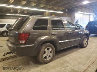 2006 Jeep Grand Cherokee Laredo with VIN 1J4GS48K26C285341, listed as a Copart auction lot 59287334 with 218,787 mi miles and Salvage Title. Bid and sale history available at carsss.com. Image 3.