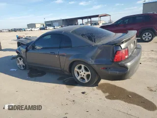 2004 Ford Mustang Standard with VIN 1FAFP40414F123816, listed as a Copart auction lot 87056634 with 0 mi miles and Salvage Title. Bid and sale history available at carsss.com. Image 2.