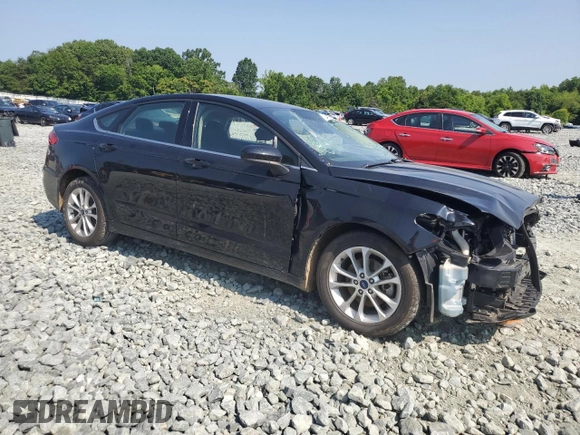 2020 Ford Fusion SE with VIN 3FA6P0HD4LR122075, listed as a Copart auction lot 59009485 with 143,247 mi miles and Salvage title. Bid and sale history available at DreamBid. Image 4.