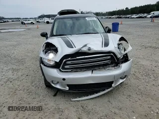 2016 MINI Countryman with VIN WMWZB3C50GWR48610, listed as a Copart auction lot 44028035 with 69,801 mi miles and Salvage title. Bid and sale history available at DreamBid. Image 10.