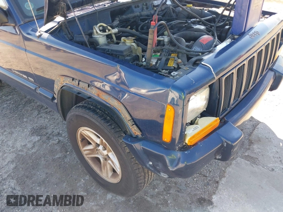 2001 Jeep Cherokee Sport with VIN 1J4FF58S21L612724, listed as a IAAI auction lot 41668763 with 122,464 mi miles and . Bid and sale history available at DreamBid. Image 6.