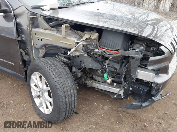 2015 Jeep Cherokee Latitude with VIN 1C4PJMCS9FW769294, listed as a IAAI auction lot 41810346 with 94,975 mi miles and . Bid and sale history available at DreamBid. Image 6.