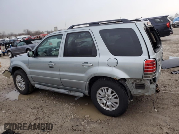 2005 Mercury Mariner Luxury z VIN 4M2CU57105DJ33266, wystawiony jako Copart lot #87002044 z przebiegiem 164 313 mil mil oraz Szkody całkowita. Historia ofert i sprzedaży dostępna na DreamBid. Obrazek 2.