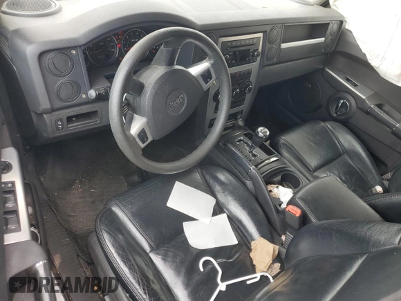 2009 Jeep Commander Sport z VIN 1J8HG48K29C531877, wystawiony jako Copart lot #58708825 z przebiegiem 198 585 mil mil oraz Szkoda całkowita • Salvage title. Historia ofert i sprzedaży dostępna na DreamBid. Obrazek 8.