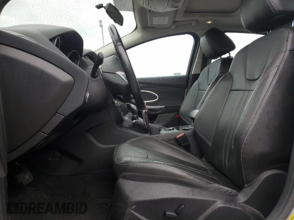 2014 Ford Focus Titanium with VIN 1FADP3N28EL418651, listed as a Copart auction lot 56723475 with 94,773 mi miles and Salvage title. Bid and sale history available at DreamBid. Image 7.