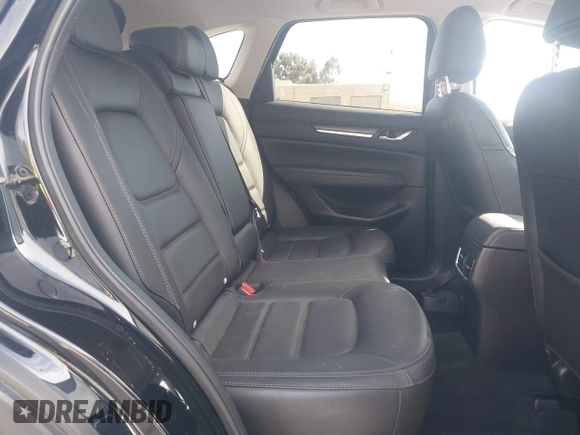 2021 Mazda CX-5 Grand Touring with VIN JM3KFBDM4M1426197, listed as a IAAI auction lot 42004644 with 43,814 mi miles. Bid and sale history available at carsss.com. Image 8.