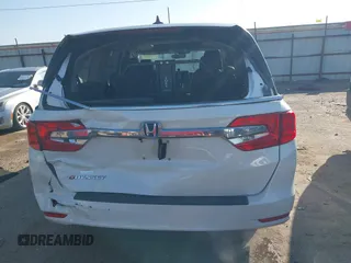 2019 Honda Odyssey EX-L z VIN 5FNRL6H76KB083005, wystawiony jako IAAI lot #41589181 z przebiegiem 27 633 mil mil oraz . Historia ofert i sprzedaży dostępna na DreamBid. Obrazek 16.