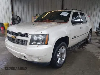 2013 Chevrolet Avalanche LTZ with VIN 3GNMCGE03DG296330, listed as a IAAI auction lot 41985209 with 265,798 mi miles and . Bid and sale history available at DreamBid. Image 2.