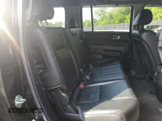 2011 Honda Pilot Touring z VIN 5FNYF4H92BB090512, wystawiony jako Copart lot #57046015 z przebiegiem 159 814 mil mil oraz Szkoda całkowita • Salvage title. Historia ofert i sprzedaży dostępna na DreamBid. Obrazek 11.