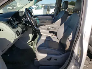 2011 Volkswagen Routan SE with VIN 2V4RW3DG3BR766608, listed as a Copart auction lot 67268015 with 144,329 mi miles and Clean title. Bid and sale history available at DreamBid. Image 7.