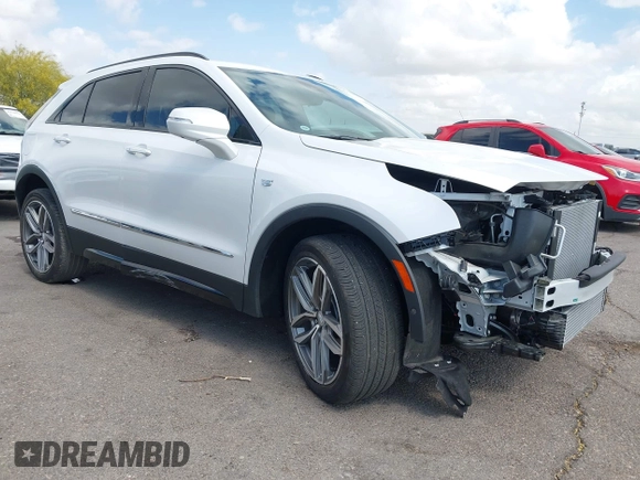 2022 Cadillac XT4 FWD Sport with VIN 1GYFZER44NF164899, listed as a IAAI auction lot 42152554 with 8,058 mi miles and . Bid and sale history available at DreamBid. Image 1.