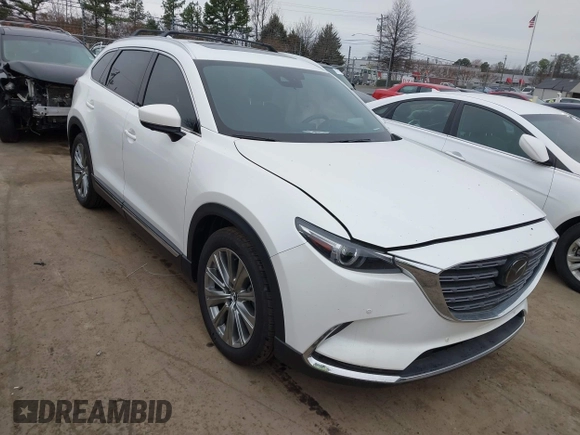 2021 Mazda CX-9 Signature with VIN JM3TCBEY7M0516772, listed as a IAAI auction lot 41553396 with 36,749 mi miles. Bid and sale history available at carsss.com. Image 1.