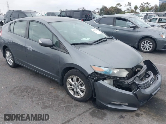 2011 Honda Insight EX z VIN JHMZE2H72BS001792, wystawiony jako IAAI lot #42207415 z przebiegiem 131 792 mil mil oraz . Historia ofert i sprzedaży dostępna na DreamBid. Obrazek 1.