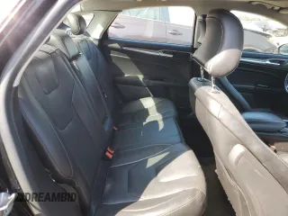 2016 Ford Fusion Titanium z VIN 3FA6P0K98GR151640, wystawiony jako Copart lot #73254594 z przebiegiem 145 473 mil mil oraz Szkoda całkowita • Salvage title. Historia ofert i sprzedaży dostępna na DreamBid. Obrazek 10.