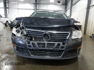 2010 Volkswagen Passat z VIN WVWJK9AN4AE096359, wystawiony jako Copart lot #50740075 z przebiegiem 196 126 mil mil oraz Szkoda całkowita • Salvage title. Historia ofert i sprzedaży dostępna na DreamBid. Obrazek 5.
