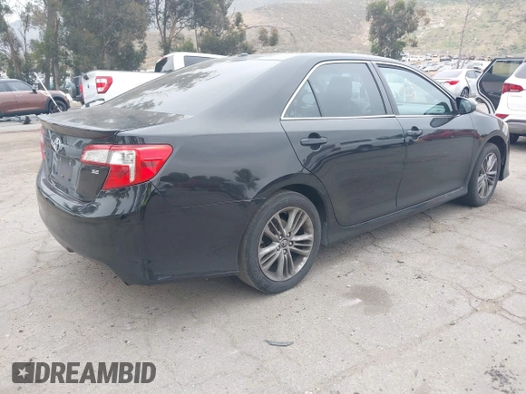 2014 Toyota Camry L with VIN 4T1BF1FK2EU816743, listed as a IAAI auction lot 42047519 with 266,904 mi miles. Bid and sale history available at carsss.com. Image 4.