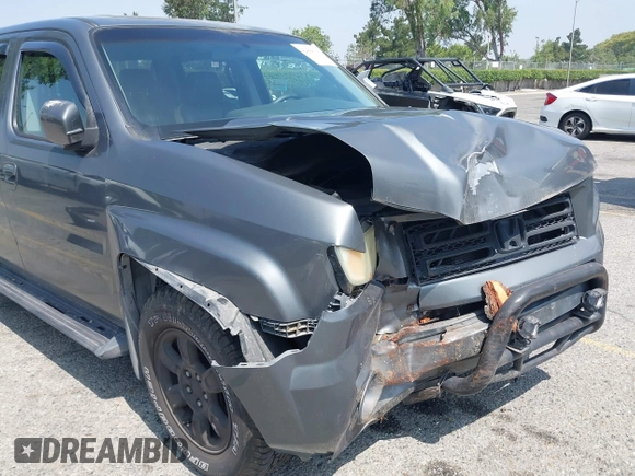2007 Honda Ridgeline RTL with VIN 2HJYK16547H502601, listed as a IAAI auction lot 42484634 with 197,253 mi miles and . Bid and sale history available at DreamBid. Image 6.