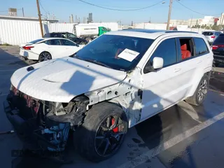 2017 Jeep Grand Cherokee SRT with VIN 1C4RJFDJ7HC600227, listed as a IAAI auction lot 41390600 with 96,841 mi miles. Bid and sale history available at carsss.com. Image 19.