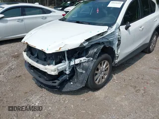 2016 Mazda CX-5 Sport with VIN JM3KE2BY6G0641051, listed as a IAAI auction lot 39959322 with 118,453 mi miles. Bid and sale history available at carsss.com. Image 6.