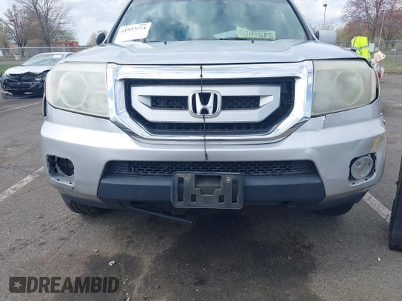 2011 Honda Pilot EX-L with VIN 5FNYF4H68BB017361, listed as a IAAI auction lot 41933024 with 338,819 mi miles and . Bid and sale history available at carsss.com. Image 4.