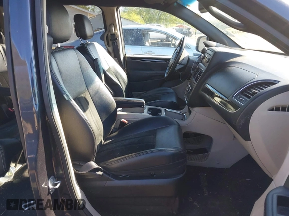 2014 Dodge Grand Caravan SXT with VIN 2C4RDGCG0ER223309, listed as a IAAI auction lot 42161438 with 175,867 mi miles and . Bid and sale history available at DreamBid. Image 5.