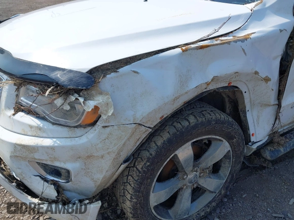 2015 Jeep Grand Cherokee Overland with VIN 1C4RJFCGXFC880096, listed as a IAAI auction lot 42706085 with 74,044 mi miles and . Bid and sale history available at DreamBid. Image 6.